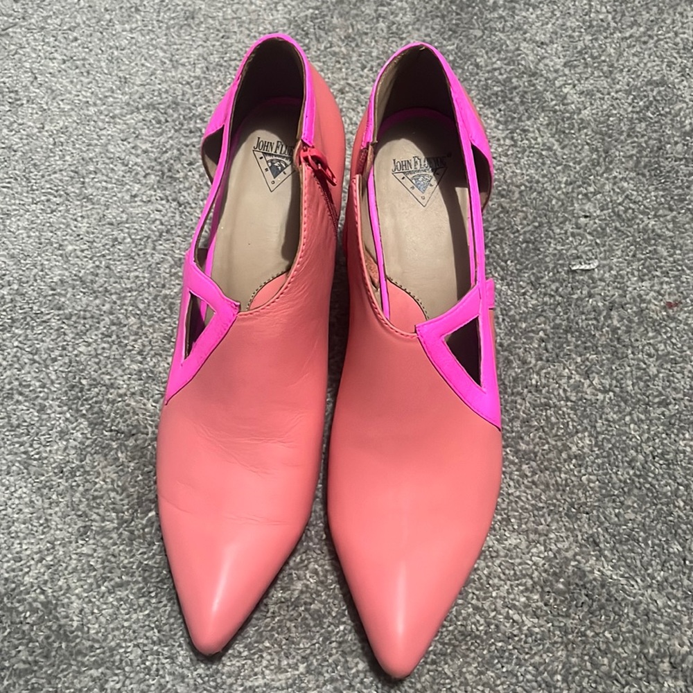 Woman’s fluevogs Shoes with a little scuff mark on the point Of both shoes